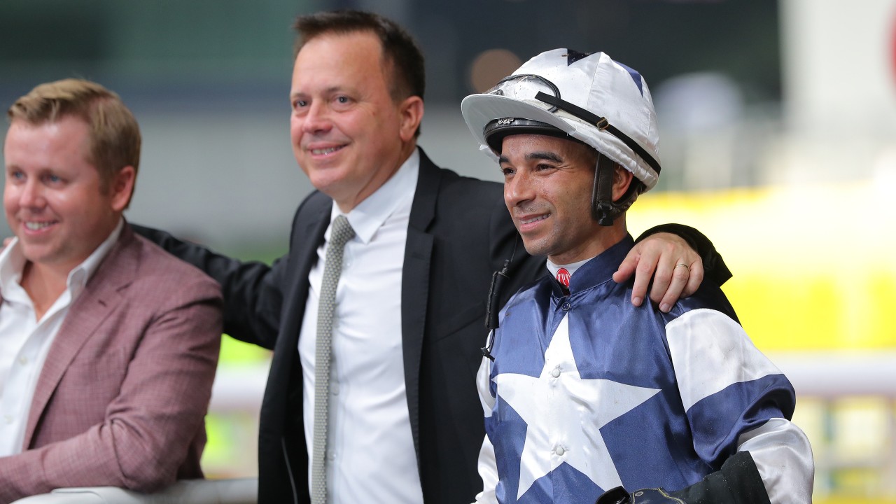 Caspar Fownes and Joao Moreira celebrate the win of The Heir at Happy Valley. Photos: Kenneth Chan