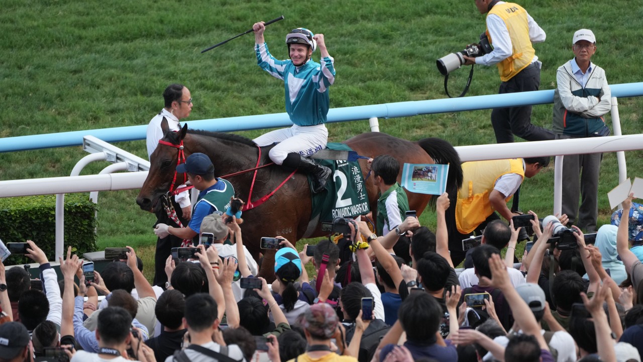 Romantic Warrior and James McDonald return after winning the Group One QEII Cup at Sha Tin. Photo: Sam Tsang