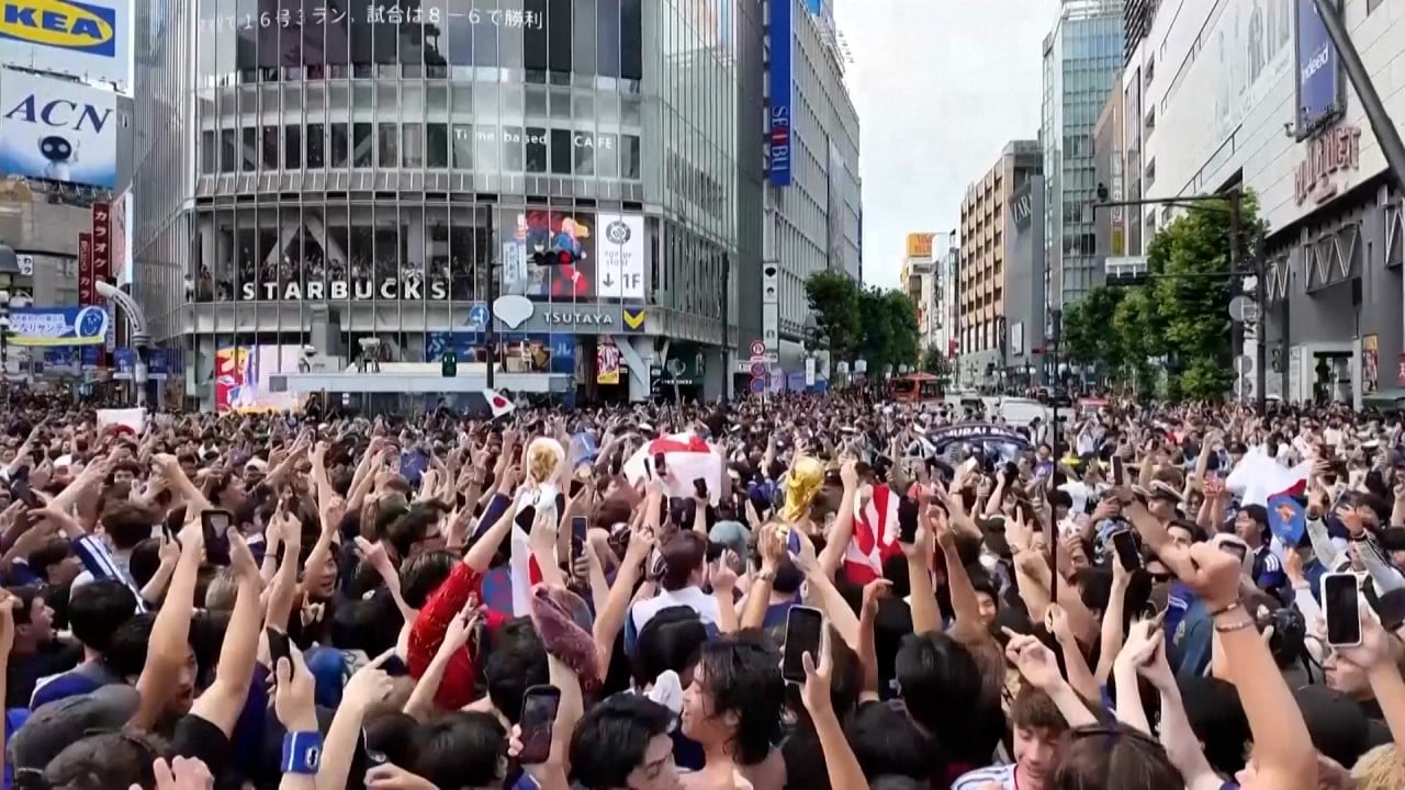 Ecstatic Japan fans flood Tokyo’s Shibuya Crossing