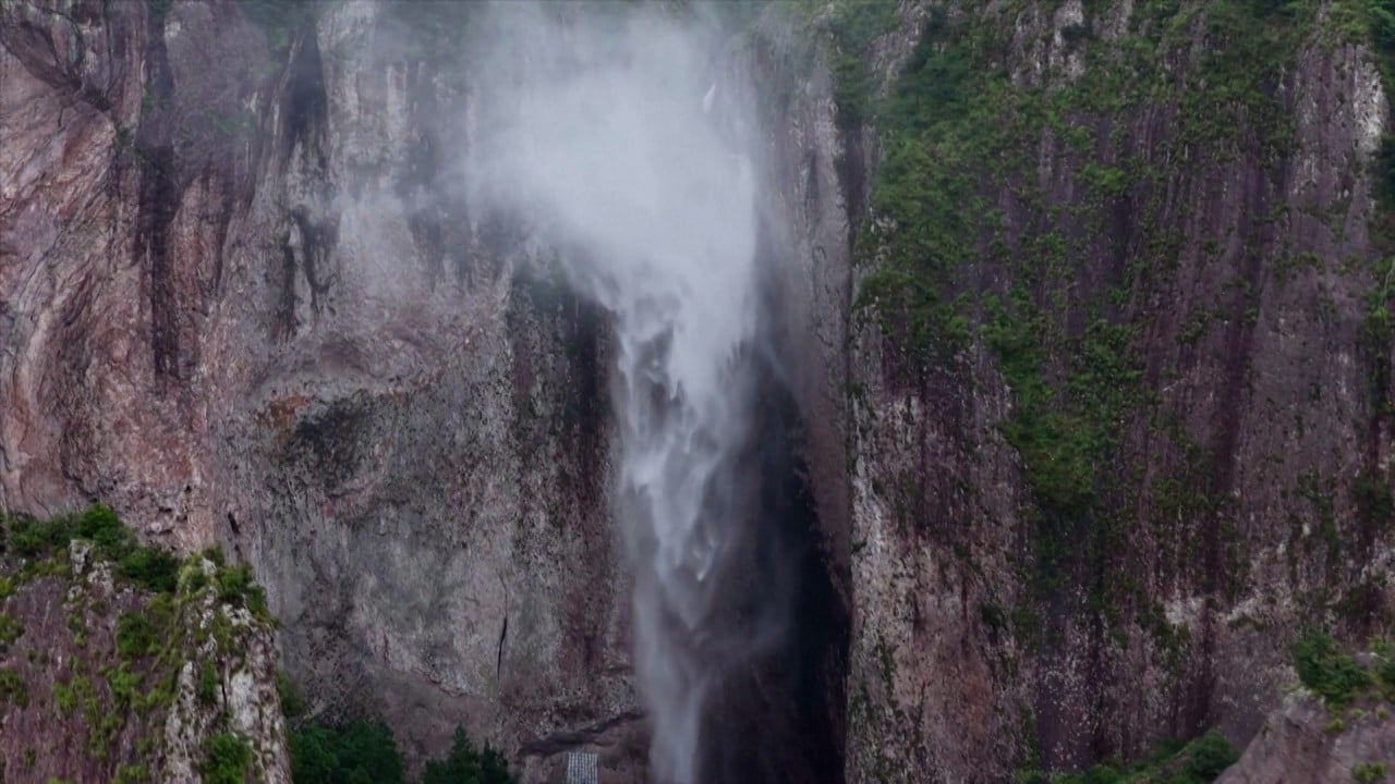 Typhoon Bavi causes ‘reverse waterfall’