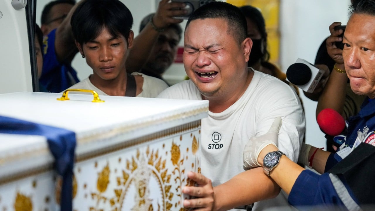 Relatives wait for bodies from Bangkok fire to be identified