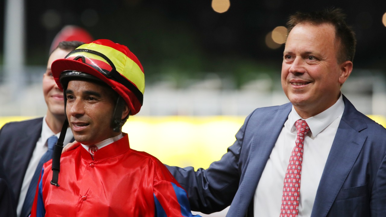 Caspar Fownes celebrates a Happy Valley victory with jockey Joao Moreira. Photos: Kenneth Chan