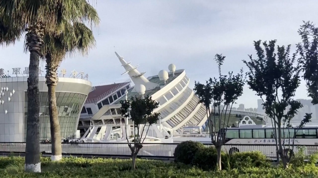 Typhoon Bavi tilts luxury cruise ship on its side
