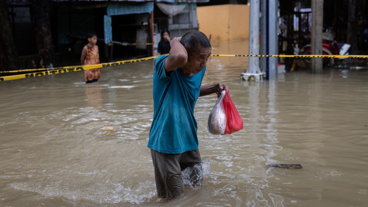 At least 12 dead in Philippine floods and landslides