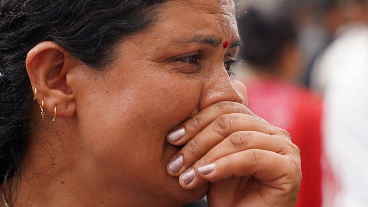 Nepal flash flood survivors wait on fate of loved ones
