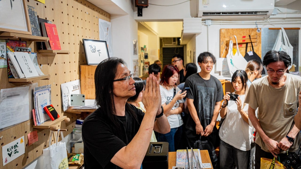 Crowds visit Hong Kong bookstore set to close after police raid