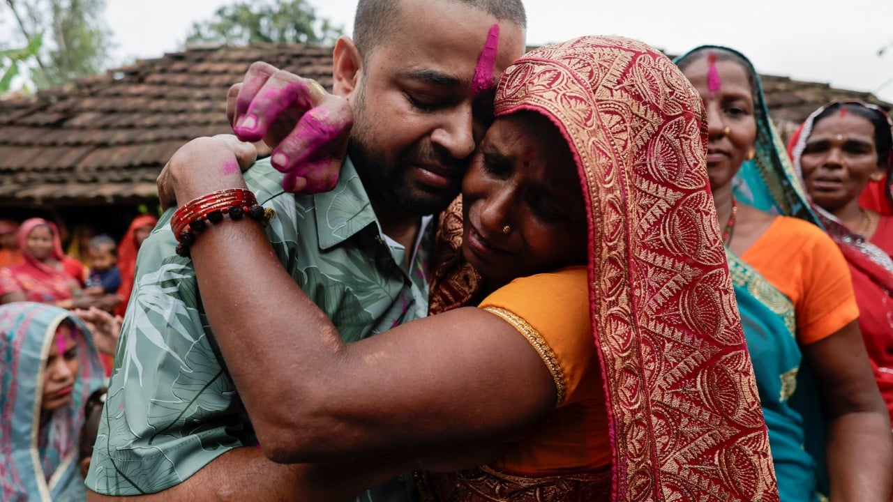 Nepal tunnel flood survivor reunited with family