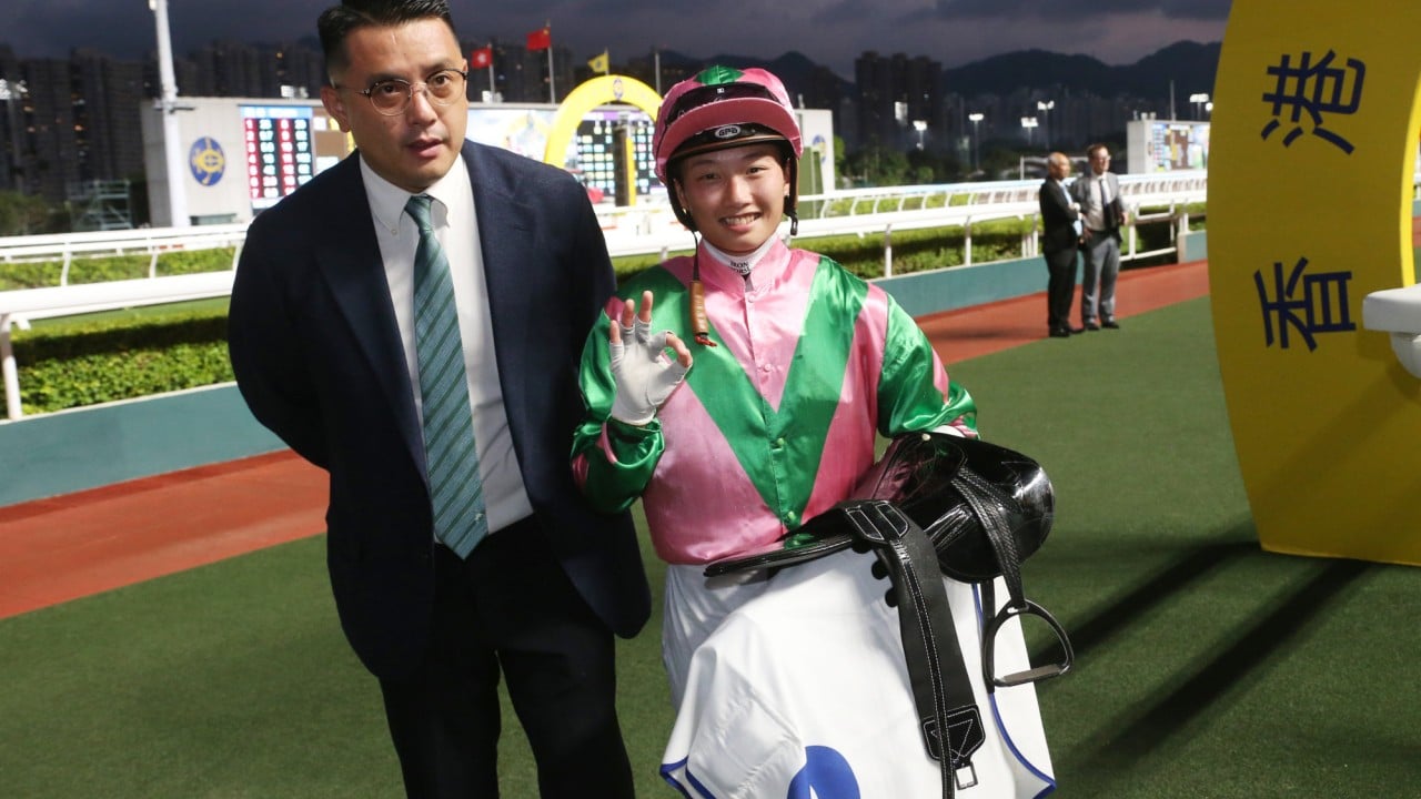 Nichola Yuen celebrates her Sha Tin treble with trainer Pierre Ng.