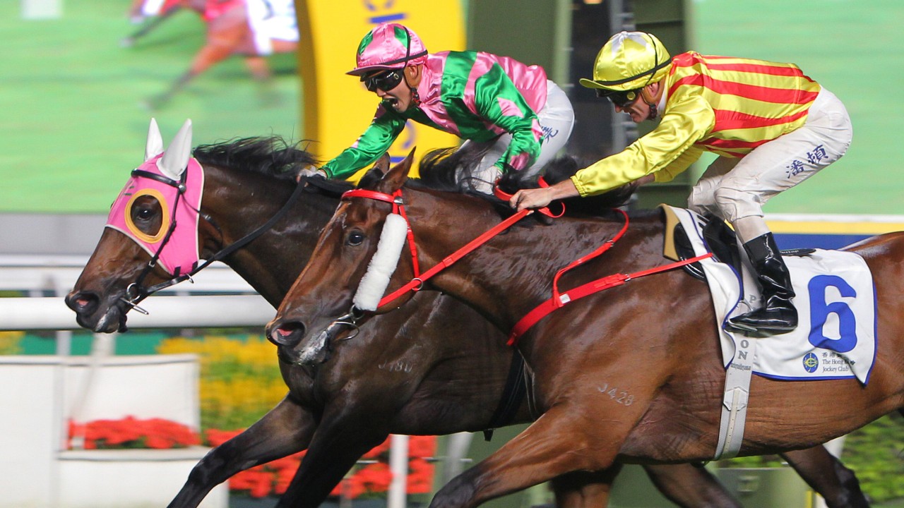 Nichola Yuen (pink) celebrates as she wins on Aeroinvincible at Sha Tin. Photos: Kenneth Chan