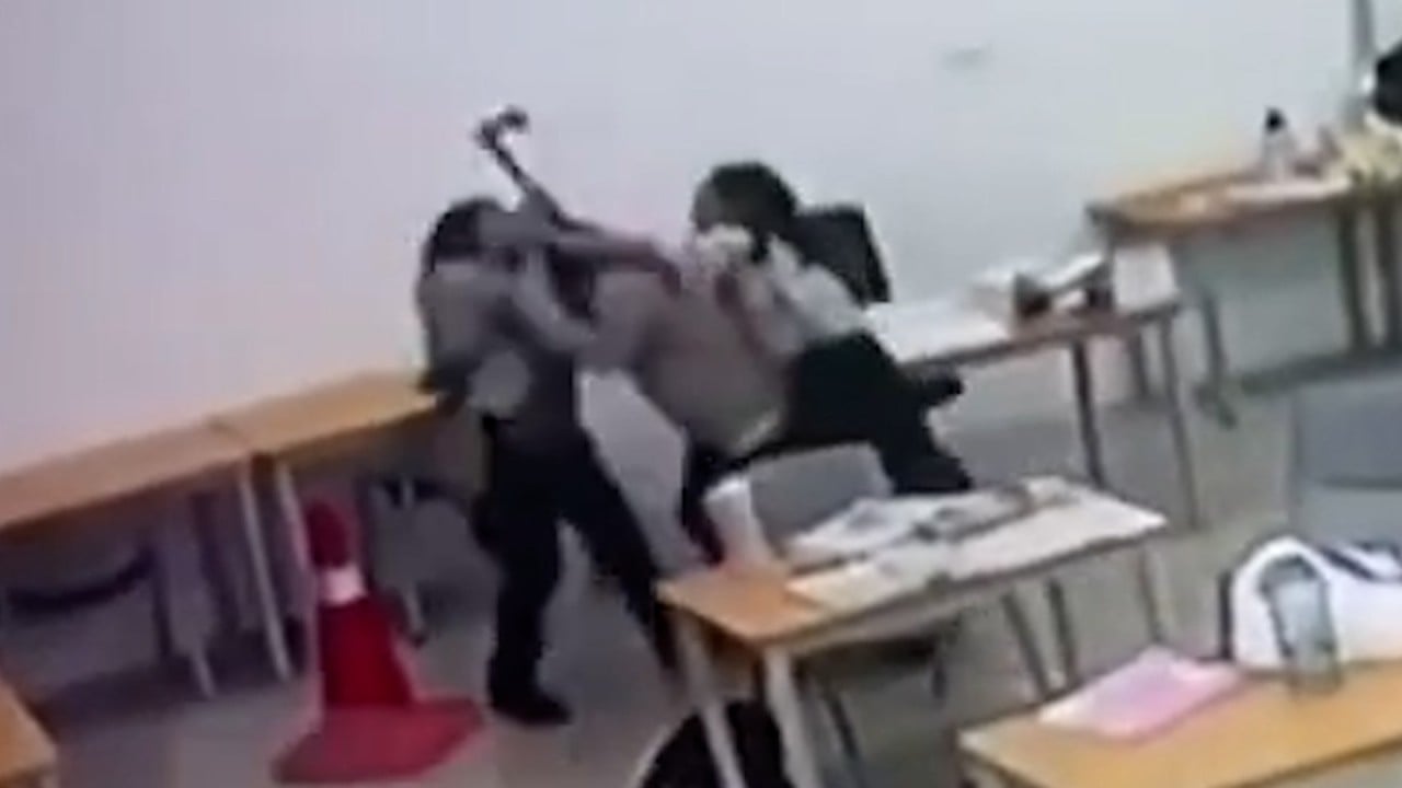 Teen live-streams axe attack on teacher in Malaysia
