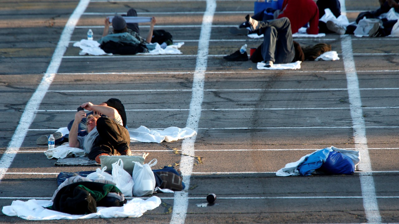 Homeless in Las Vegas placed in outdoor parking lot for social-distancing