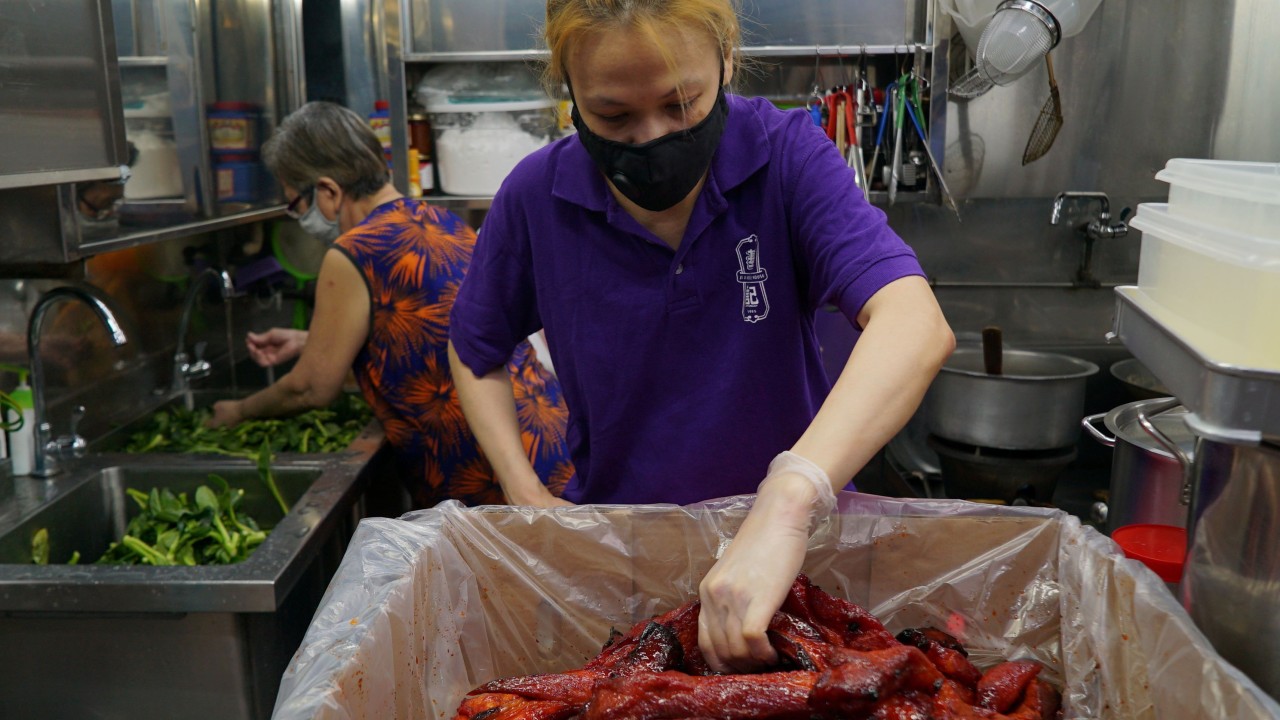 ‘Last-generation’ Singapore hawker fights to weather pandemic