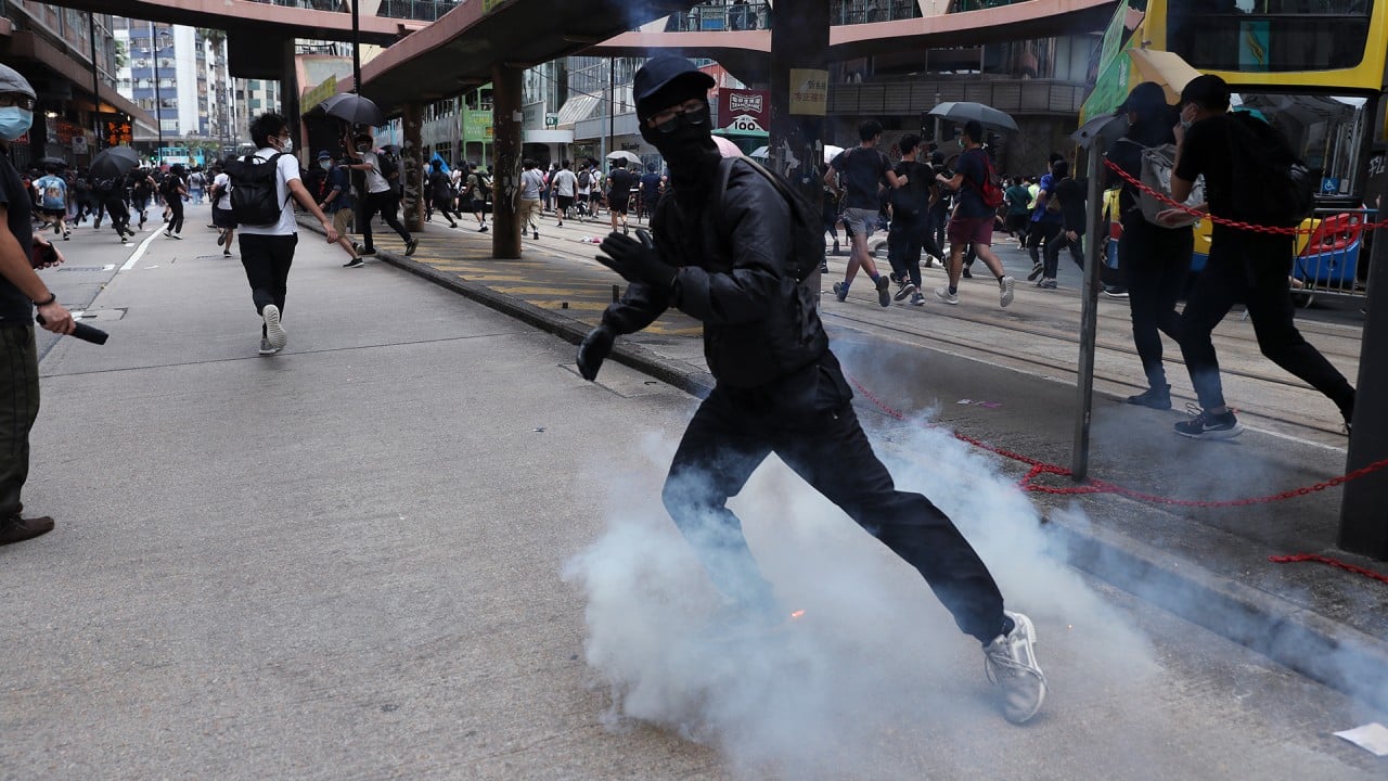 Tear gas fired as thousands protest Beijing’s planned national security law for Hong Kong