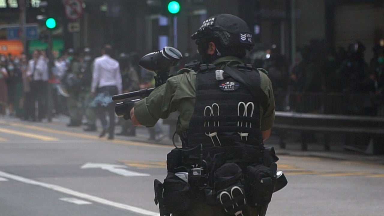 Hong Kong police fire pepper rounds at protesters opposing national anthem law 