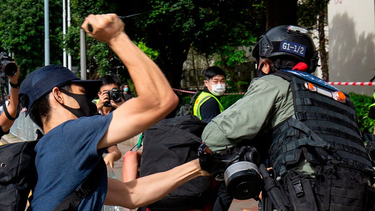 Hong Kong Police officer stabbed in the arm