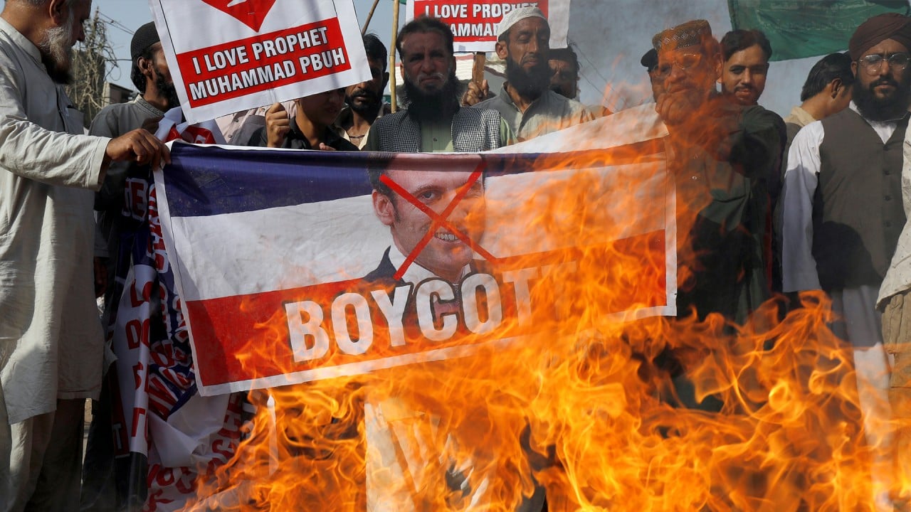 Muslims protest against French leader’s defence of Prophet Mohammed cartoons, call for boycott