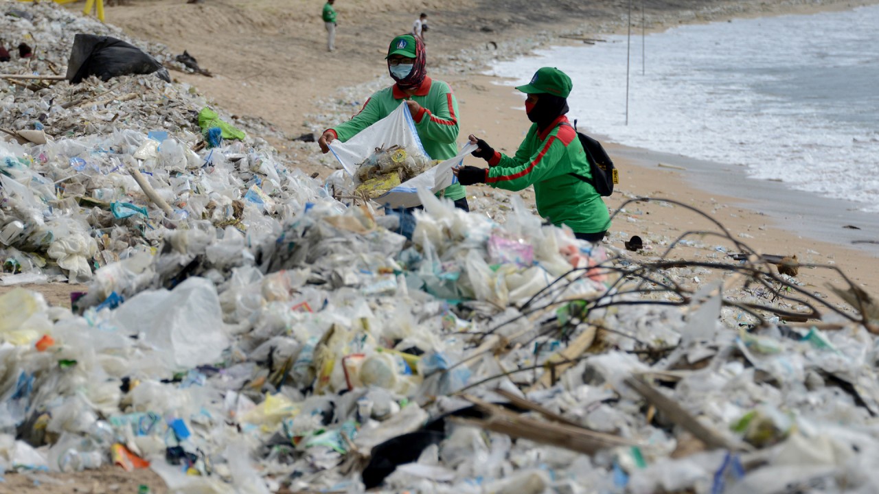 Bali's famous beaches buried in plastic garbage pushed ashore by annual monsoon 