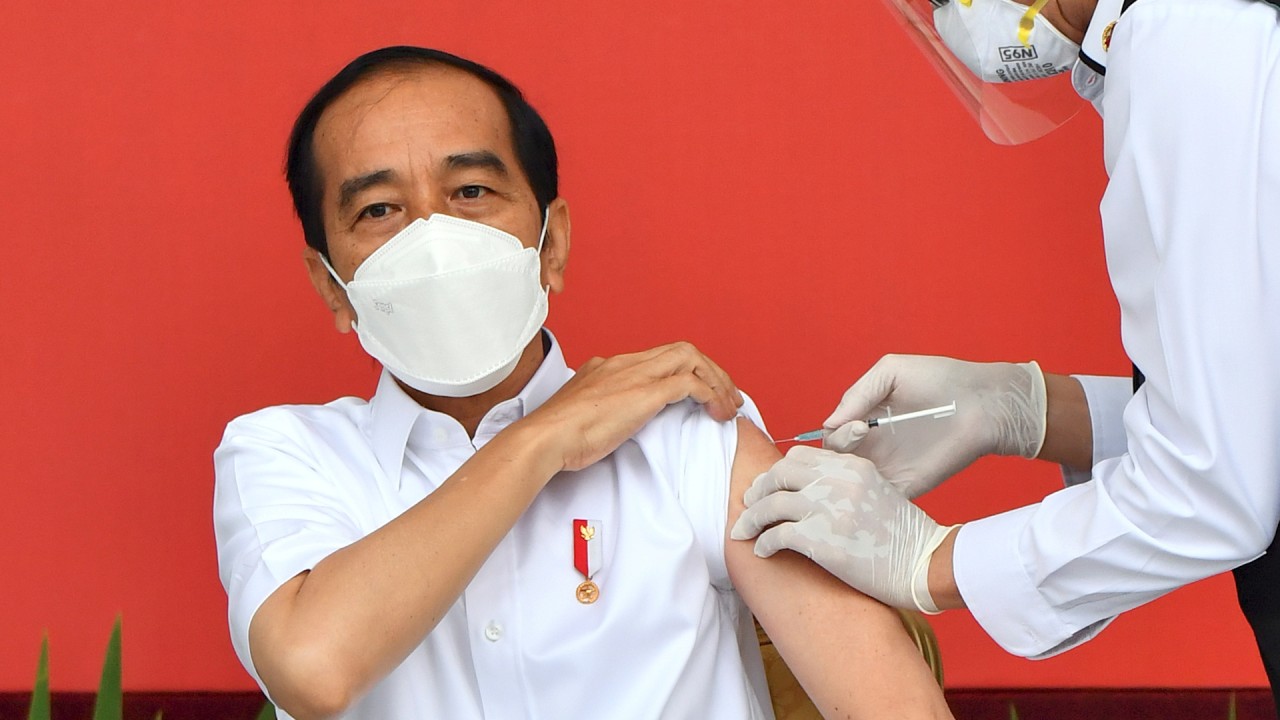 Joko Widodo gets first Sinovac vaccine shot as Indonesia starts mass Covid-19 inoculations 