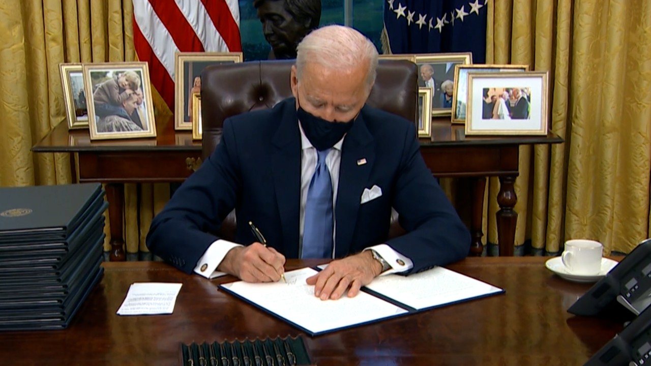 President Biden signs first-day executive orders for US return to Paris climate accord, WHO and more