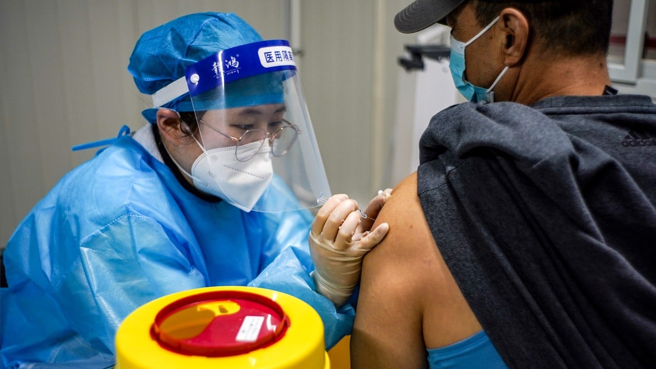 China pushes mass vaccinations to build herd immunity against Covid-19 