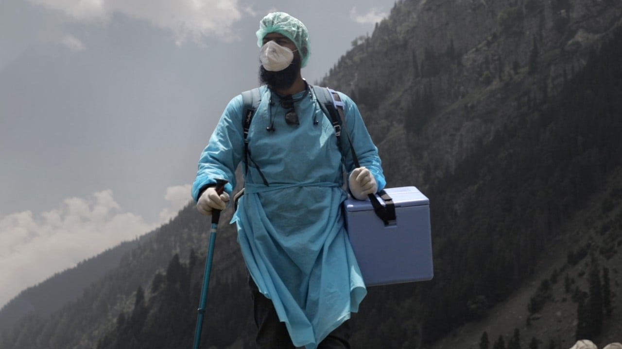 Health workers trek to remote areas to bring Covid-19 vaccines to Indian-administered Kashmir