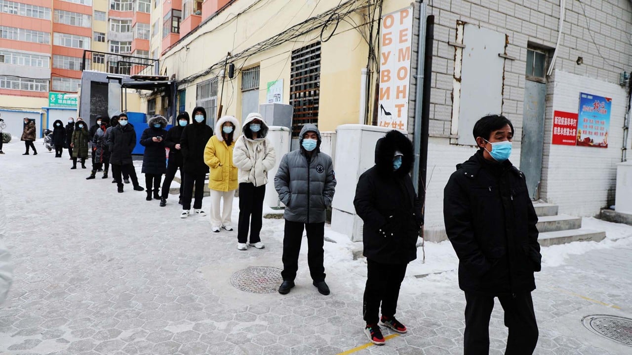 People line up in snow for Covid-19 testing amid outbreak in northern China border city