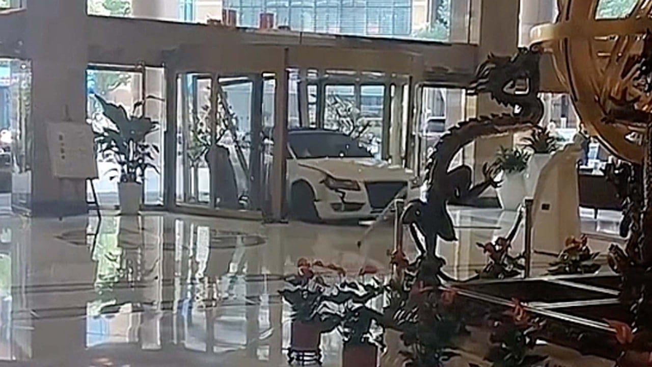Man in China smashes Audi into hotel after dispute with staff