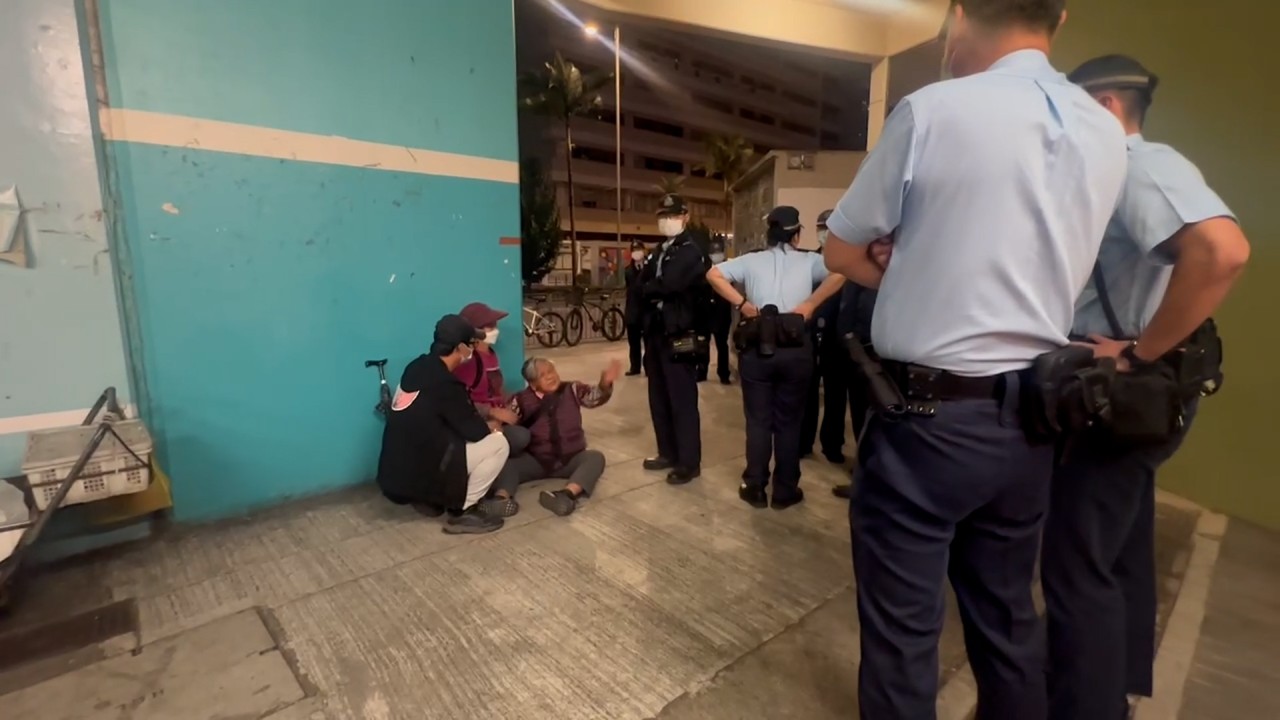 Video of 90-year-old Hong Kong hawker pleading with officers after her cart was seized goes viral 