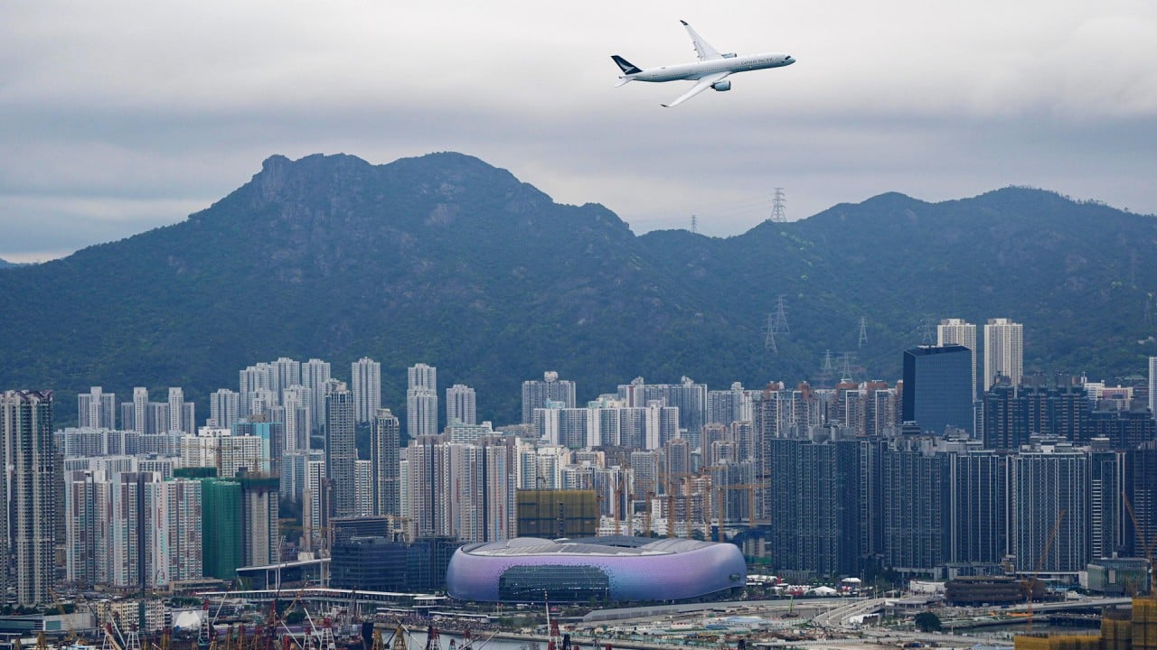 Cathay Pacific plane flies past Hong Kong’s Kai Tak once again 