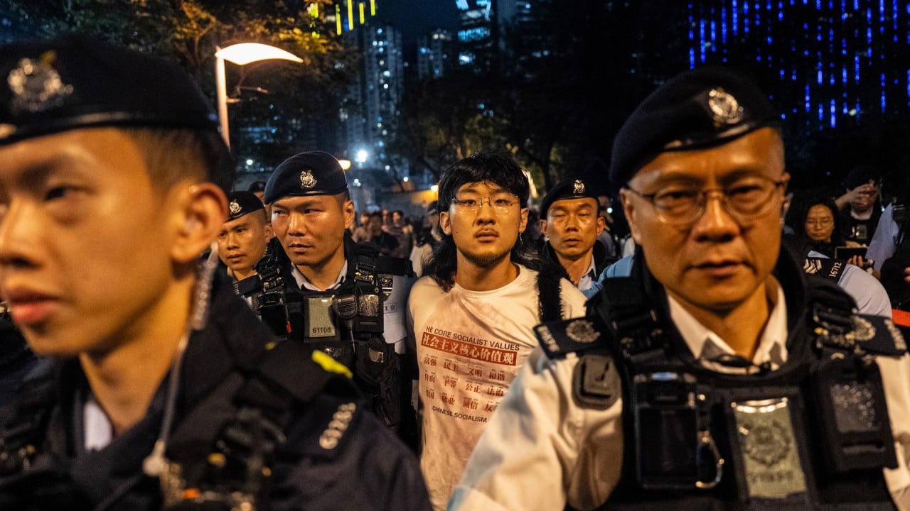 Hong Kong police arrest 2, take away 10 during Tiananmen vigil patrol