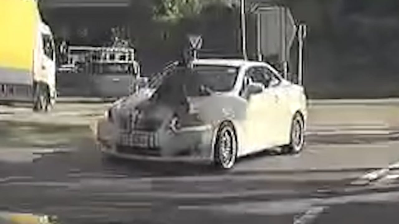 Man clings to bonnet of speeding car after argument with girlfriend