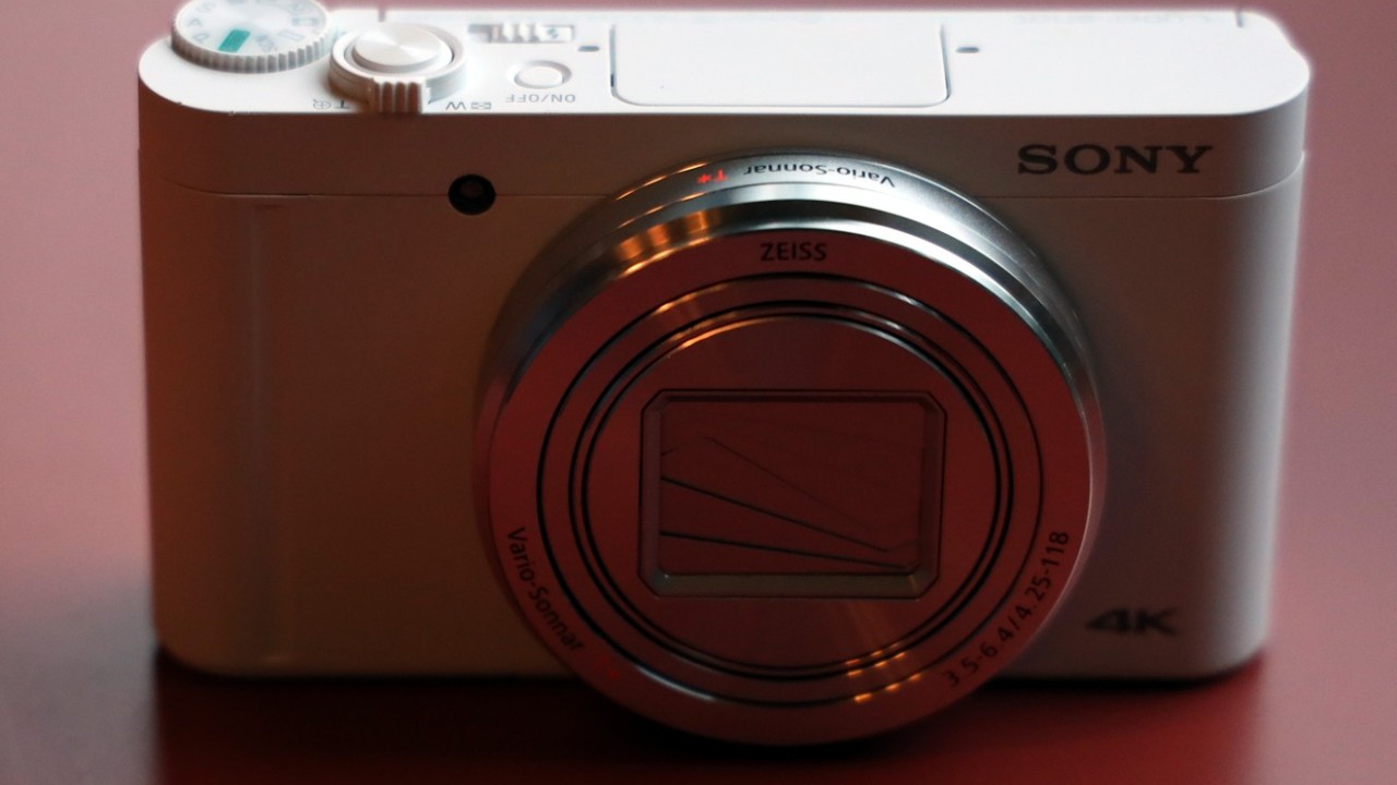 Pocket-sized Sony DSC-WX800 digital camera's zoom lens packs a