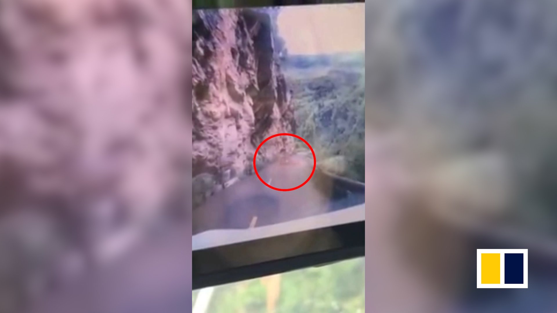 Huge boulder falls on moving car in China