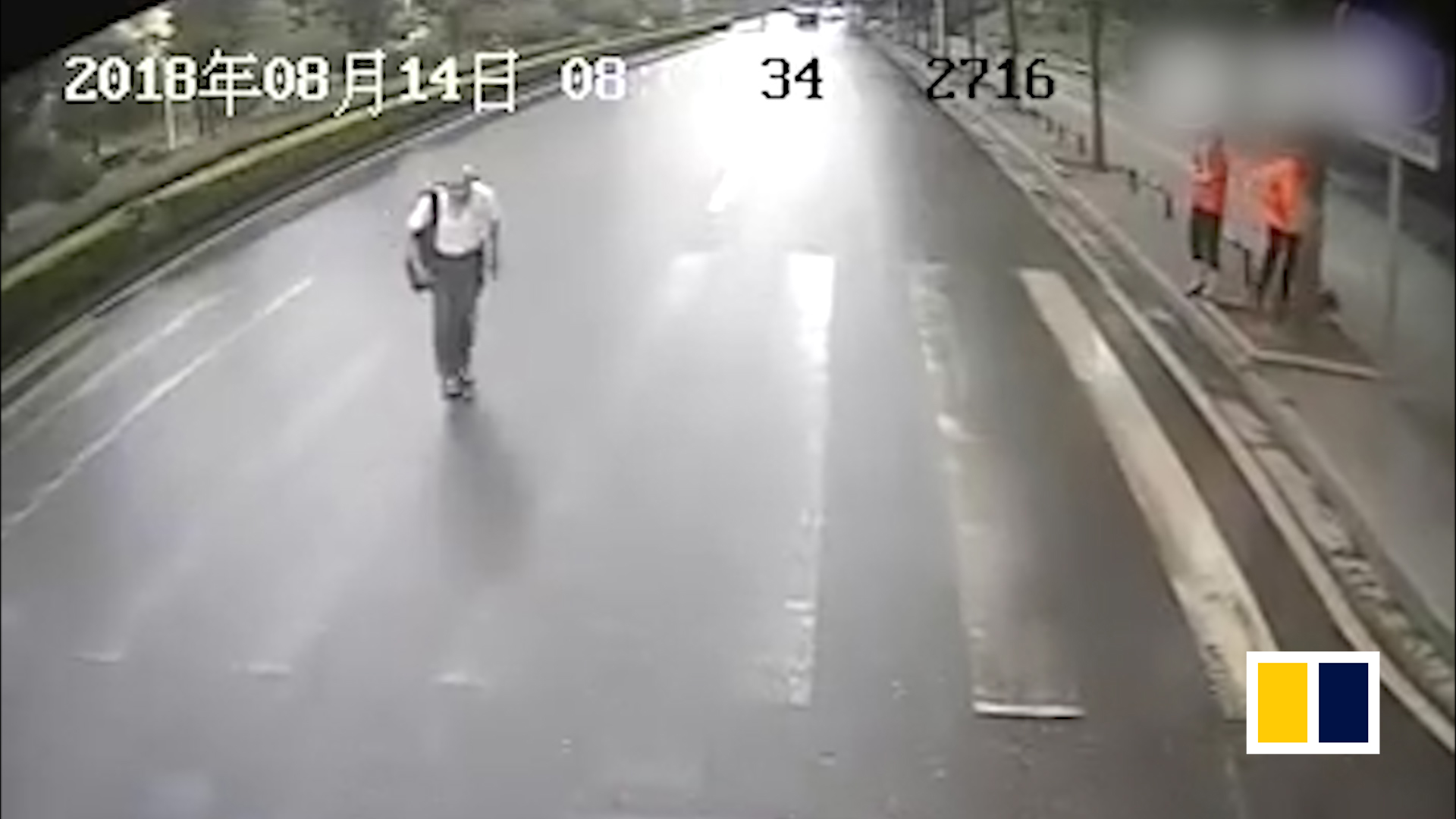 Elderly pedestrian thanks courteous driver